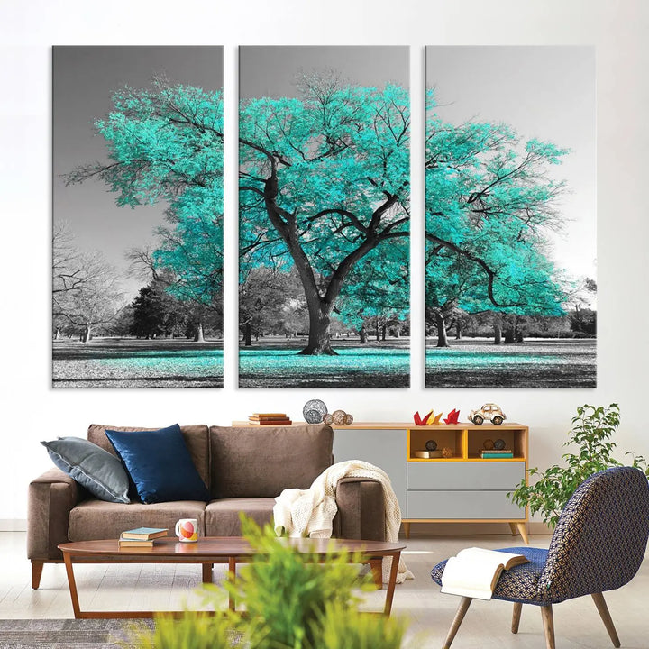 The "Turquoise Tree Canvas Wall Art Multi Piece Canvas Print" features a stunning triptych of a tree with turquoise leaves, printed on museum-quality canvas and coated for UV protection. The artwork arrives ready to hang, instantly enhancing the charm of your space.