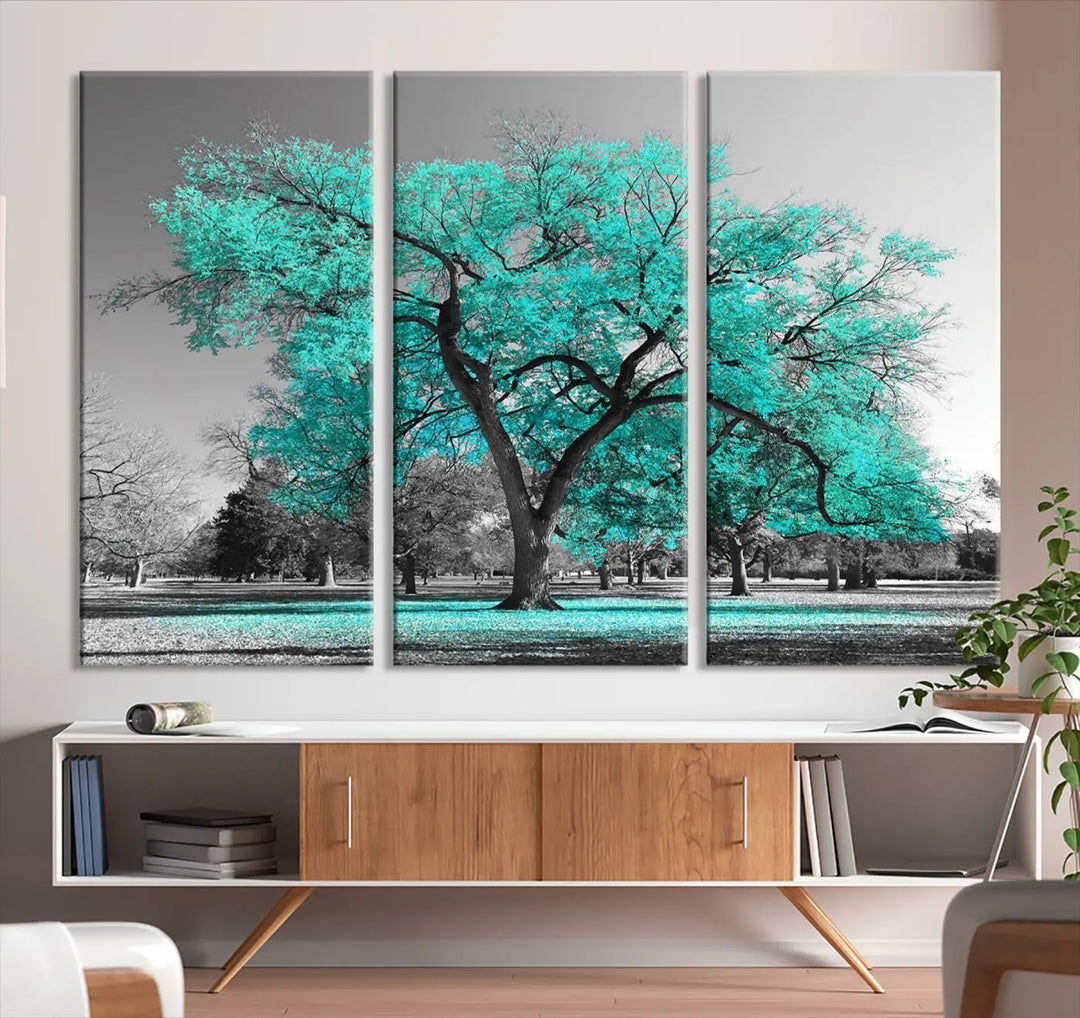 The "Turquoise Tree Canvas Wall Art Multi Piece Canvas Print" features a stunning triptych of a tree with turquoise leaves, printed on museum-quality canvas and coated for UV protection. The artwork arrives ready to hang, instantly enhancing the charm of your space.