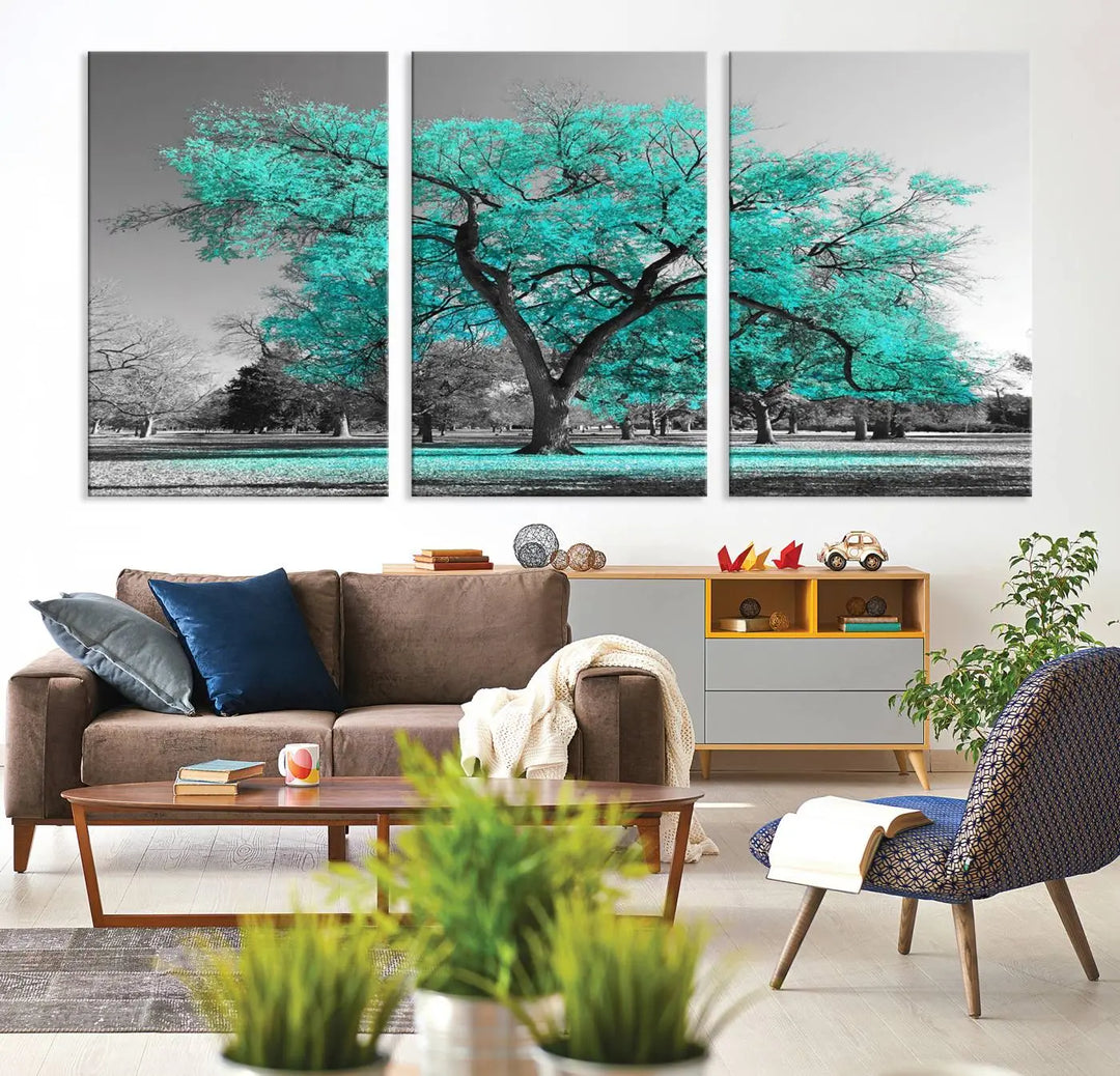 The "Turquoise Tree Canvas Wall Art Multi Piece Canvas Print" features a stunning triptych of a tree with turquoise leaves, printed on museum-quality canvas and coated for UV protection. The artwork arrives ready to hang, instantly enhancing the charm of your space.