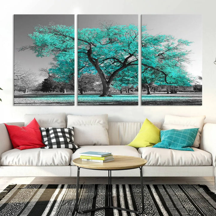 The "Turquoise Tree Canvas Wall Art Multi Piece Canvas Print" features a stunning triptych of a tree with turquoise leaves, printed on museum-quality canvas and coated for UV protection. The artwork arrives ready to hang, instantly enhancing the charm of your space.