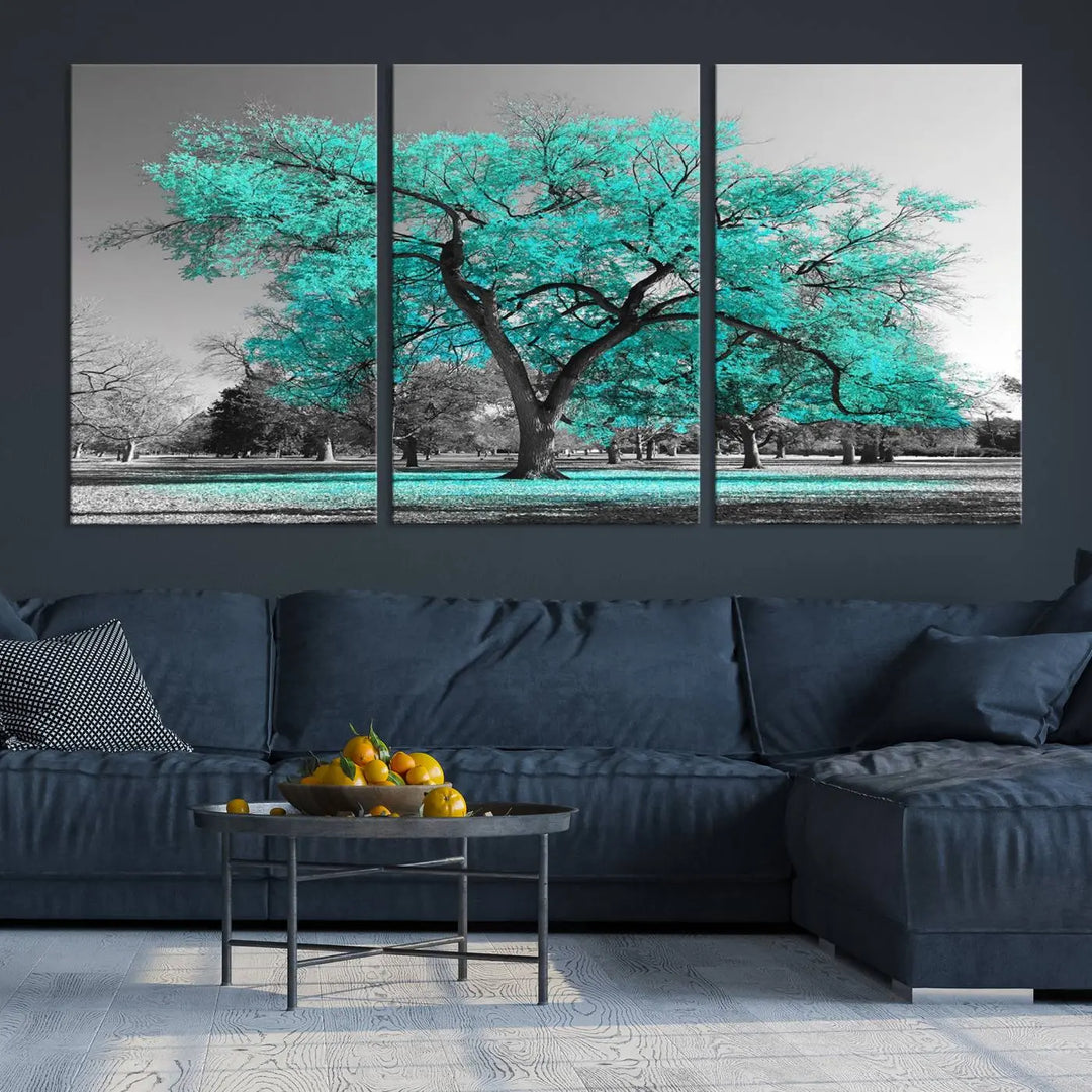 The "Turquoise Tree Canvas Wall Art Multi Piece Canvas Print" features a stunning triptych of a tree with turquoise leaves, printed on museum-quality canvas and coated for UV protection. The artwork arrives ready to hang, instantly enhancing the charm of your space.