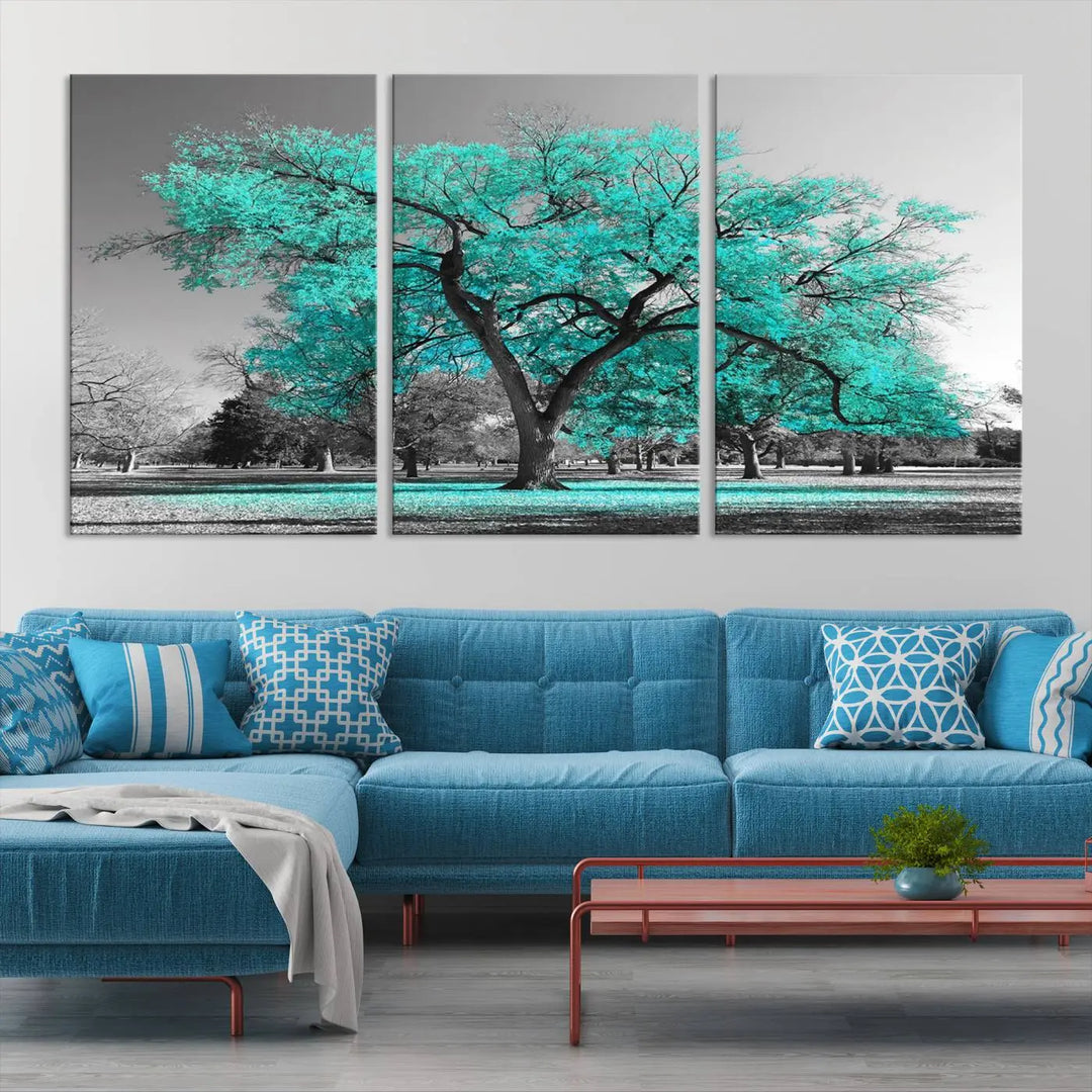 The "Turquoise Tree Canvas Wall Art Multi Piece Canvas Print" features a stunning triptych of a tree with turquoise leaves, printed on museum-quality canvas and coated for UV protection. The artwork arrives ready to hang, instantly enhancing the charm of your space.