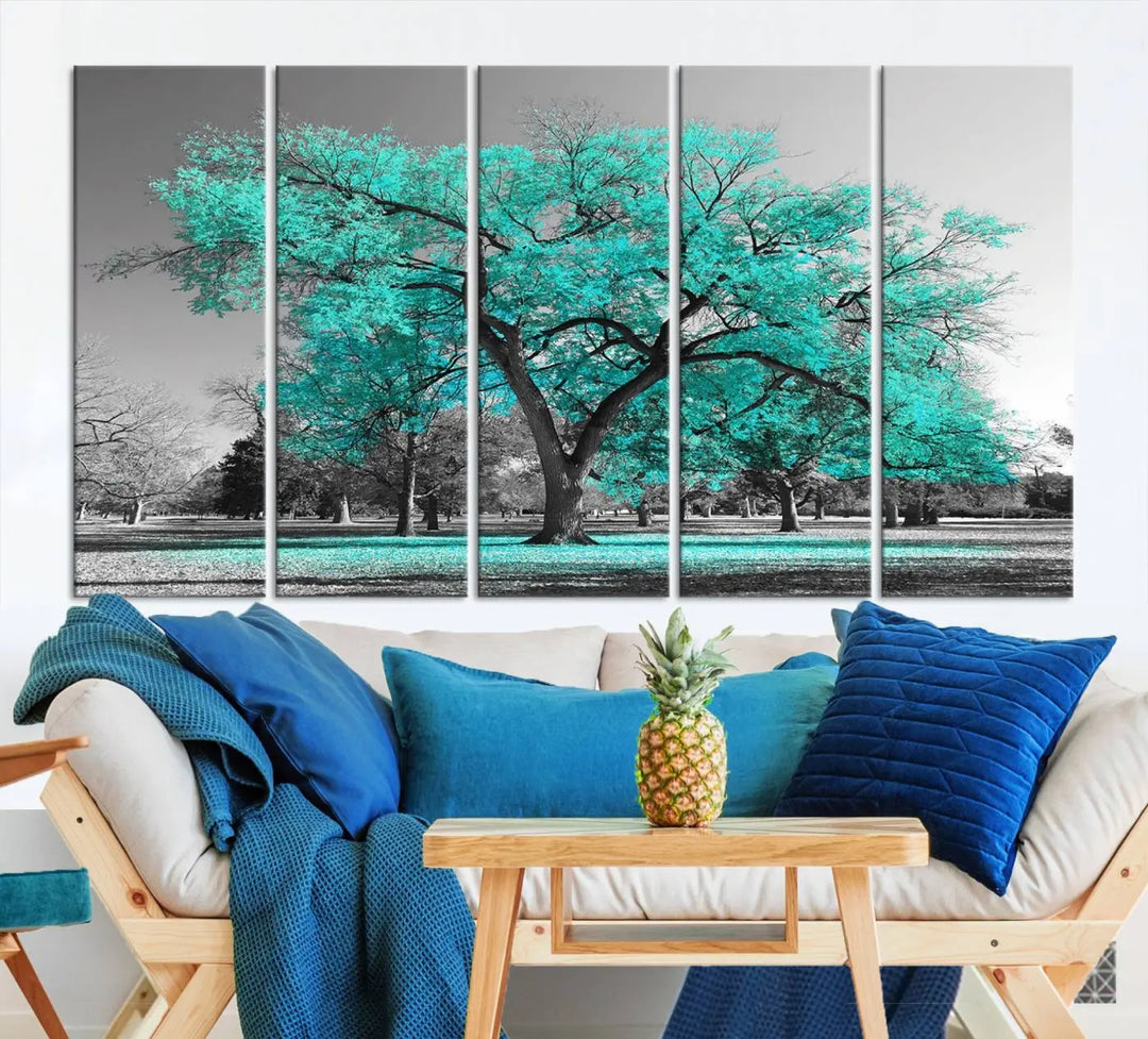 The "Turquoise Tree Canvas Wall Art Multi Piece Canvas Print" features a stunning triptych of a tree with turquoise leaves, printed on museum-quality canvas and coated for UV protection. The artwork arrives ready to hang, instantly enhancing the charm of your space.