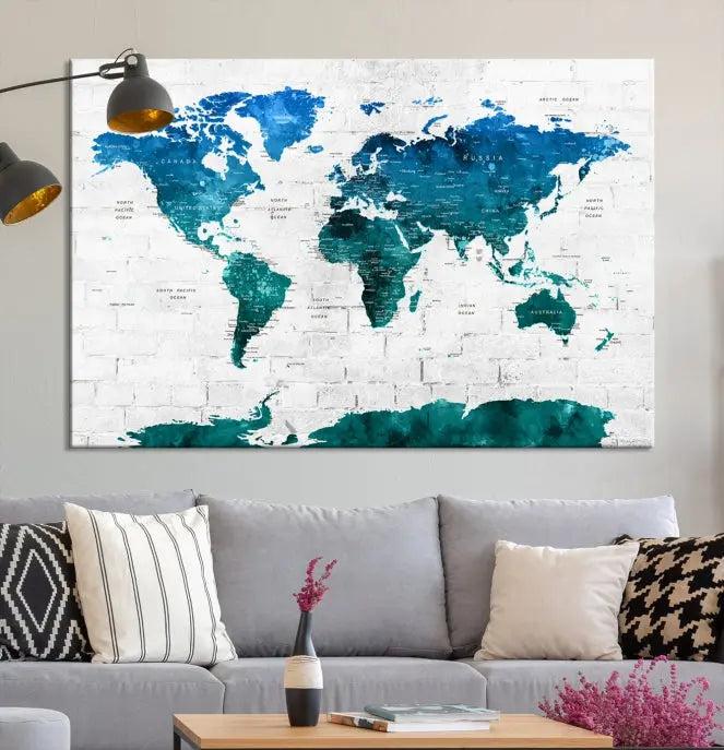 The Turquoise Wall Art World Map Watercolor Canvas Print is highlighted on the brick wall, emphasizing the allure of museum-quality canvases. This gallery-wrapped piece, complete with a UV-protective coating, enhances the elegance of the setting.