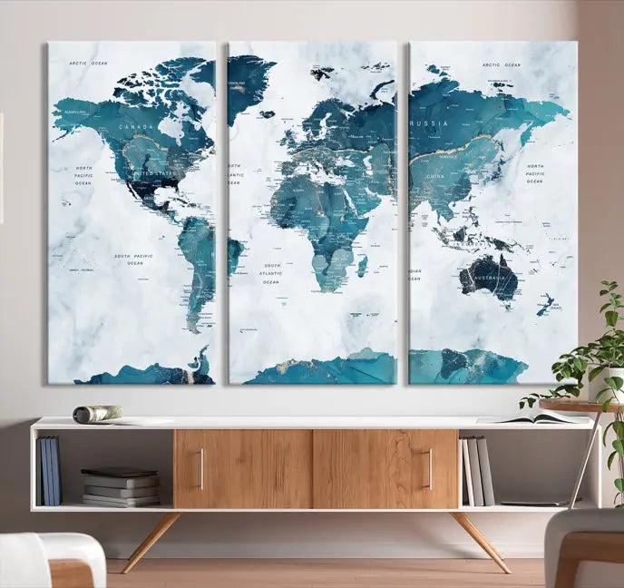 The Turquoise World Map Wall Art Canvas Print elegantly graces a dark wall. Crafted on museum-quality canvas with a UV-protective coating, it promises lasting elegance.