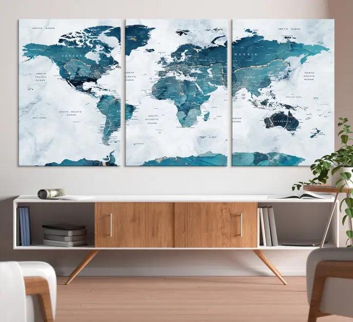 The Turquoise World Map Wall Art Canvas Print elegantly graces a dark wall. Crafted on museum-quality canvas with a UV-protective coating, it promises lasting elegance.