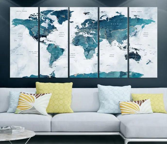 The Turquoise World Map Wall Art Canvas Print elegantly graces a dark wall. Crafted on museum-quality canvas with a UV-protective coating, it promises lasting elegance.