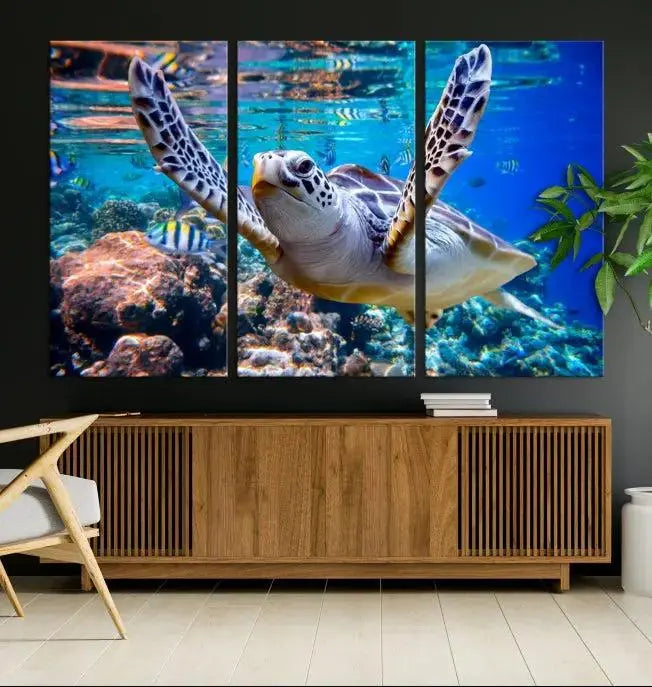 A living room showcasing a triptych of the Turtle and Ocean Life Wall Art Canvas Print.