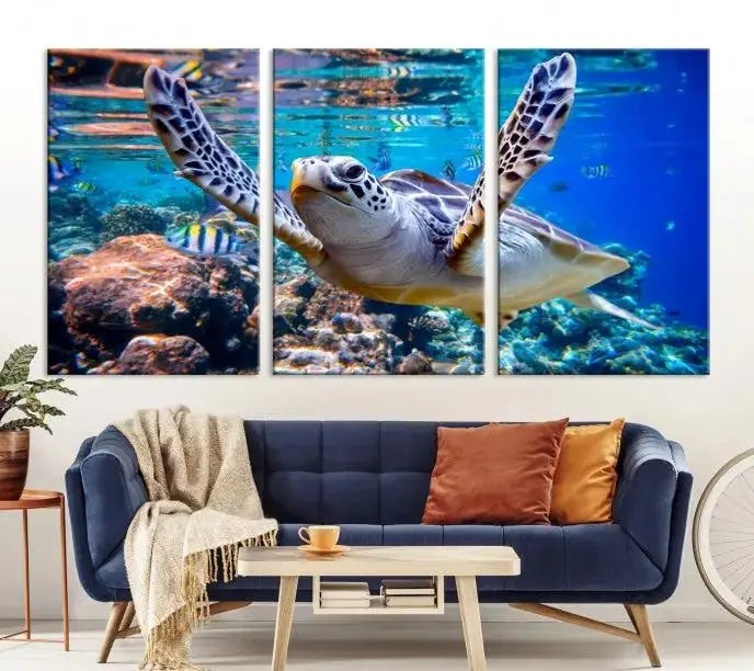 A living room showcasing a triptych of the Turtle and Ocean Life Wall Art Canvas Print.