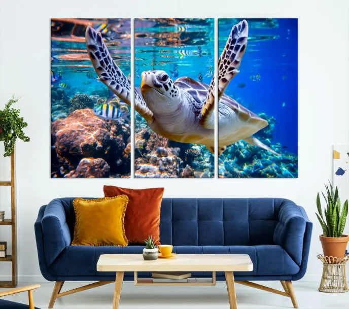 A living room showcasing a triptych of the Turtle and Ocean Life Wall Art Canvas Print.