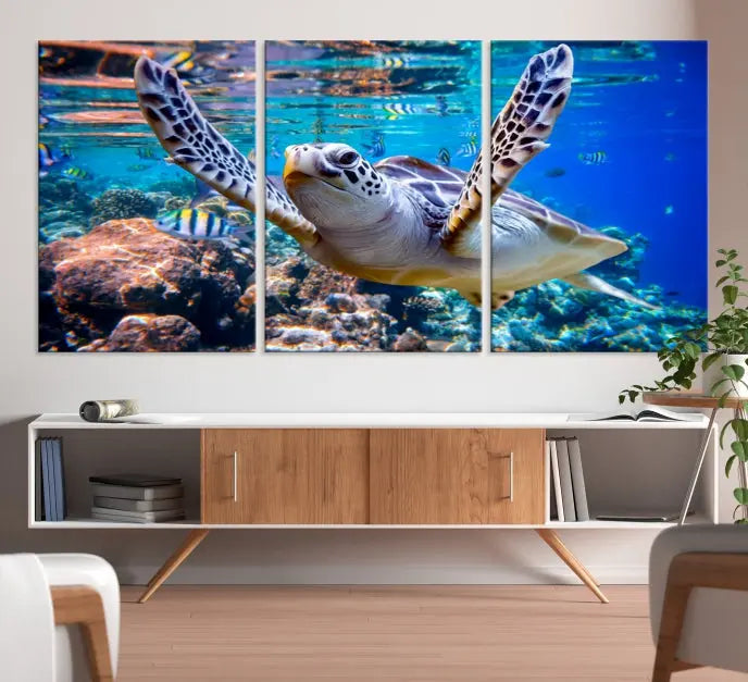 A living room showcasing a triptych of the Turtle and Ocean Life Wall Art Canvas Print.