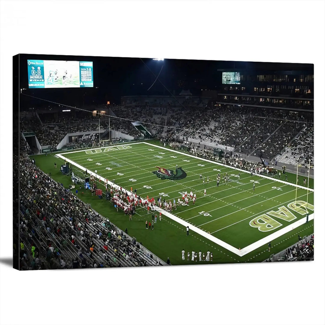 A dining area showcasing a gallery-quality triptych of the UAB Blazers Football Team Print at Birmingham Protective Stadium adorns the wall.