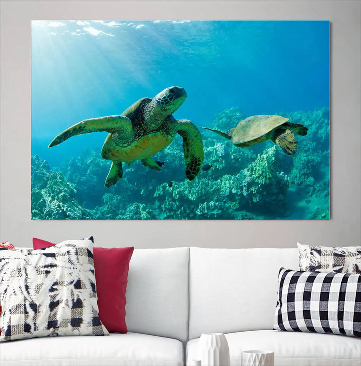 In a contemporary living room, the wall is beautifully adorned by "Underwater Coral Reef Adventure with Sea Turtle," a set of vibrant giclee prints showcasing marine life.