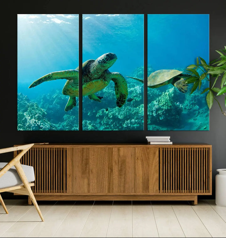 In a contemporary living room, the wall is beautifully adorned by "Underwater Coral Reef Adventure with Sea Turtle," a set of vibrant giclee prints showcasing marine life.