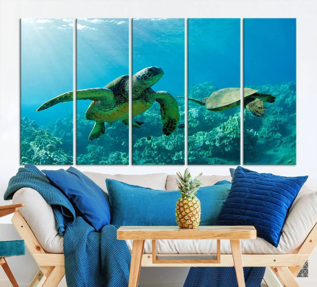 In a contemporary living room, the wall is beautifully adorned by "Underwater Coral Reef Adventure with Sea Turtle," a set of vibrant giclee prints showcasing marine life.