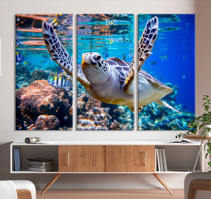 The "Underwater Sea Turtle Wall Art Canvas Print" features a sea turtle gliding elegantly over a vibrant coral reef, creating a stunning focal point. It comes ready to hang for easy display.