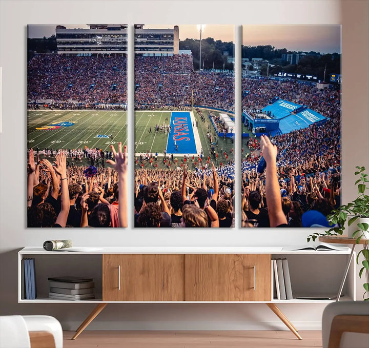 A University of Kansas Jayhawks Football Team Print, featuring the Lawrence Kansas Memorial Stadium and printed on premium canvas with a gallery-quality finish, hangs above the space.