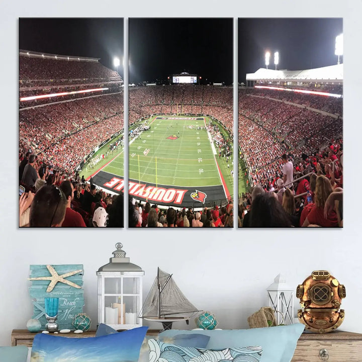 A canvas print featuring the University of Louisville Cardinals Football Team and a bustling Cardinal Stadium at night adorns the wall.