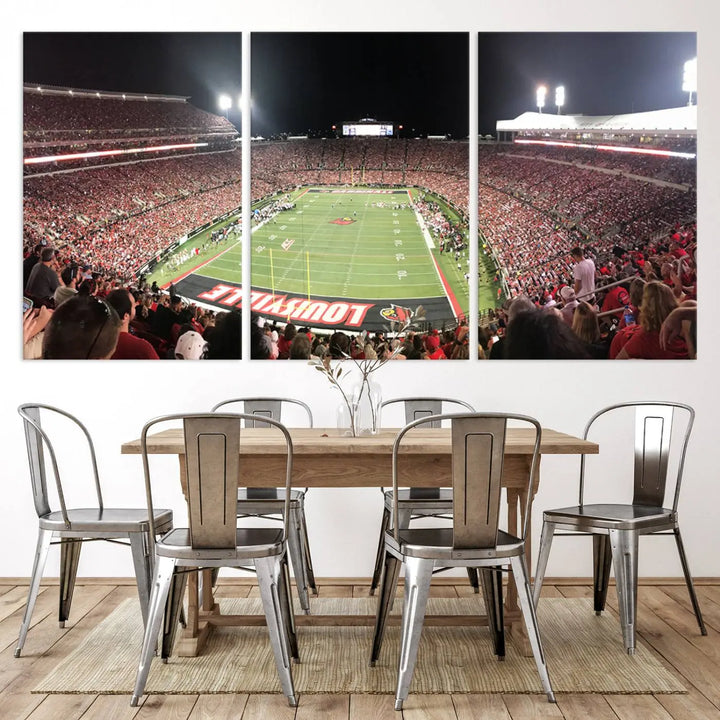 A canvas print featuring the University of Louisville Cardinals Football Team and a bustling Cardinal Stadium at night adorns the wall.