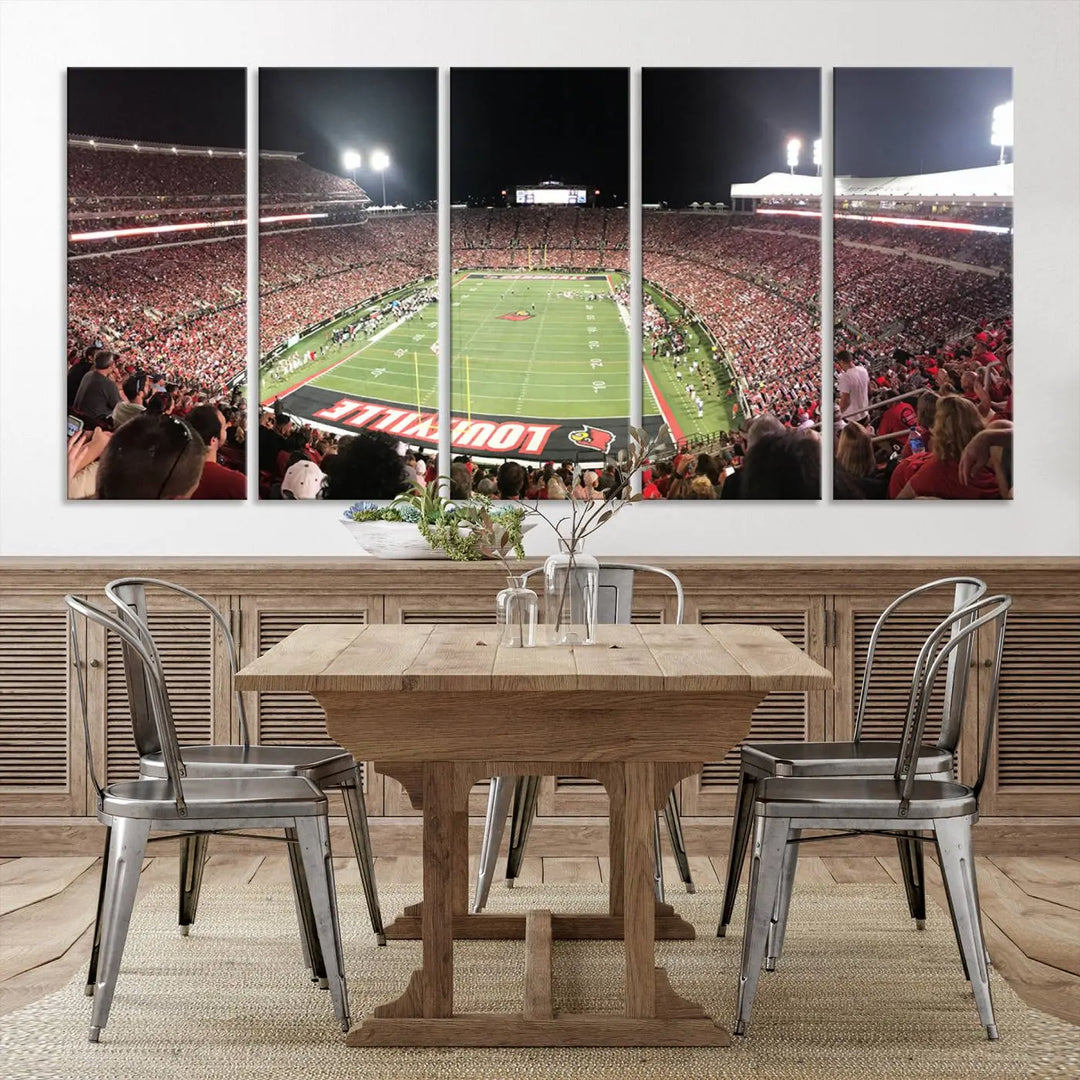 A canvas print featuring the University of Louisville Cardinals Football Team and a bustling Cardinal Stadium at night adorns the wall.