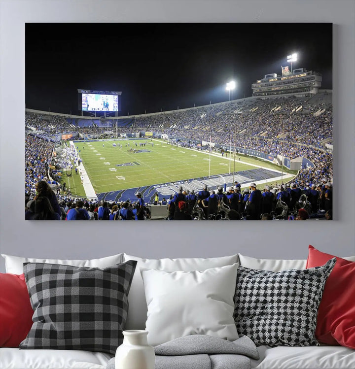 A triptych featuring the University of Memphis Tigers football team at the bustling Simmons Bank Liberty Stadium during a night game is artistically crafted as canvas wall art with a gallery-quality finish. Handmade in the USA, it encapsulates the vibrant energy of sports under dazzling night lights.