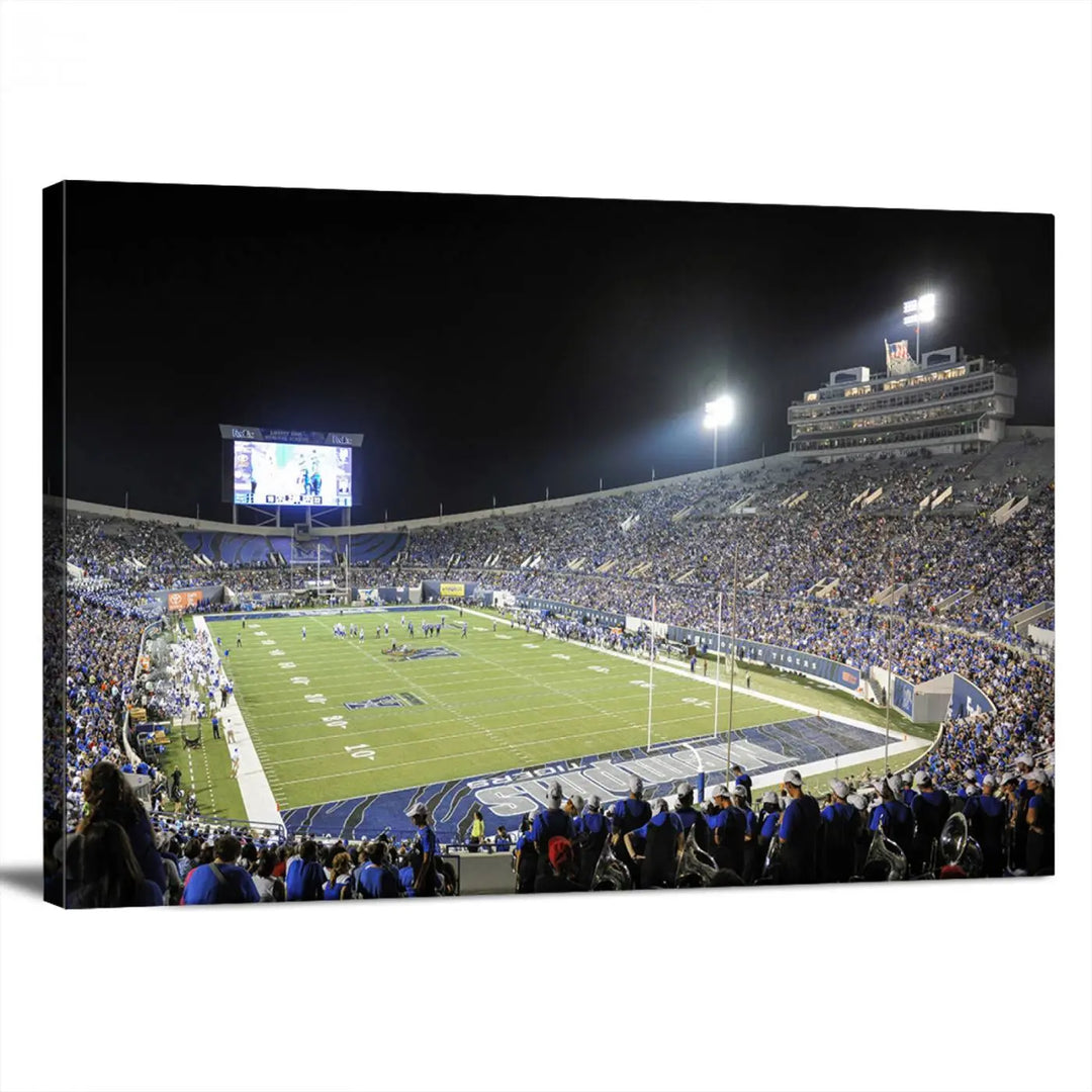 A triptych featuring the University of Memphis Tigers football team at the bustling Simmons Bank Liberty Stadium during a night game is artistically crafted as canvas wall art with a gallery-quality finish. Handmade in the USA, it encapsulates the vibrant energy of sports under dazzling night lights.