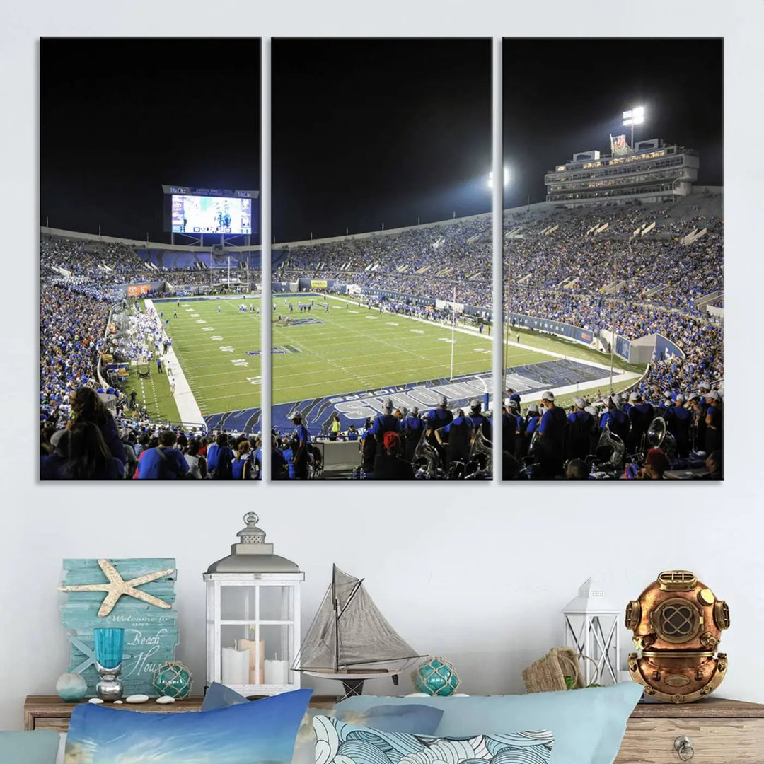 A triptych featuring the University of Memphis Tigers football team at the bustling Simmons Bank Liberty Stadium during a night game is artistically crafted as canvas wall art with a gallery-quality finish. Handmade in the USA, it encapsulates the vibrant energy of sports under dazzling night lights.