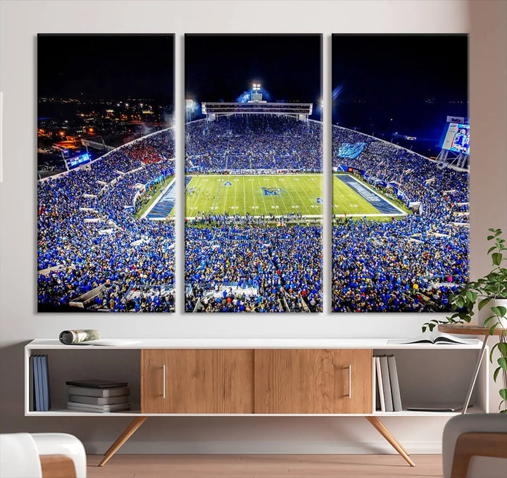 The University of Memphis Tigers Football Team Print captures the essence of a bustling Simmons Bank Liberty Stadium at night. This impressive three-panel wall art, crafted on premium canvas, features a gallery-quality finish that enhances its vibrant colors and intricate details.