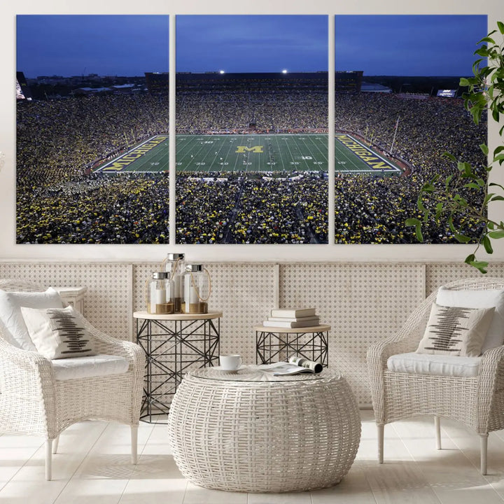 Experience the excitement and grandeur of a packed football stadium at night with this University of Michigan Wolverines Football Team Print. Featuring a panoramic view of the iconic Ann Arbor Michigan Stadium and its green field adorned with a large M logo, this canvas artwork offers a gallery-quality finish that brings an energetic moment into your space.