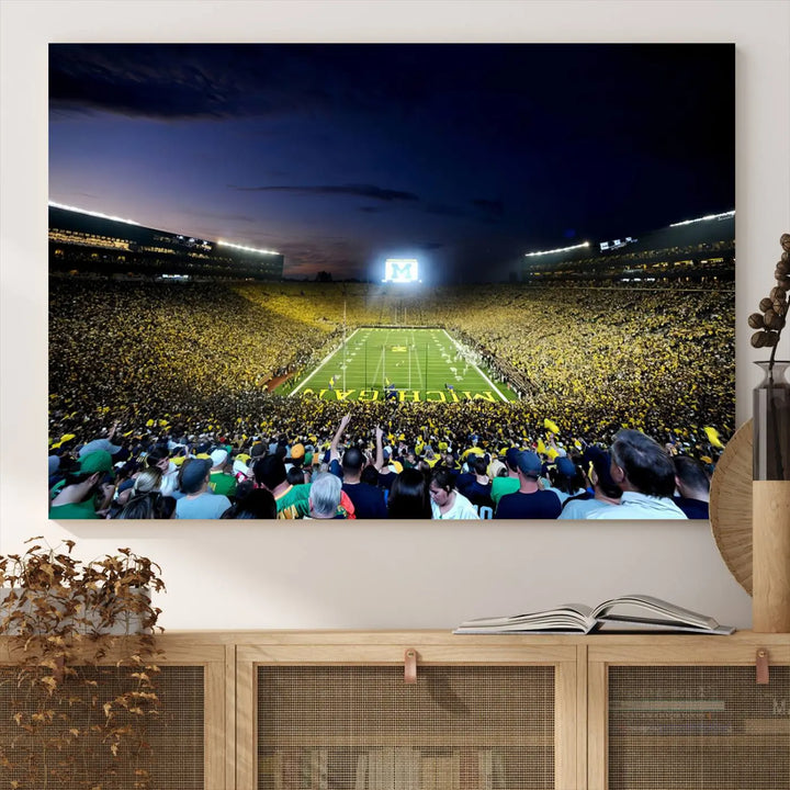 A triptych canvas art titled "University of Michigan Wolverines Football Team Print - Ann Arbor Michigan Stadium Wall Art Canvas Print" hangs prominently, featuring a gallery-quality finish and proudly handmade in the USA.