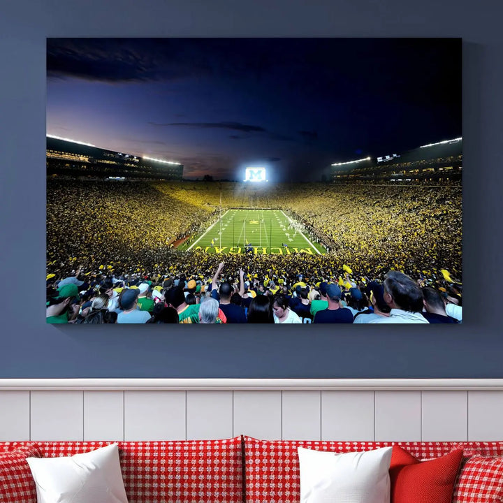 A triptych canvas art titled "University of Michigan Wolverines Football Team Print - Ann Arbor Michigan Stadium Wall Art Canvas Print" hangs prominently, featuring a gallery-quality finish and proudly handmade in the USA.