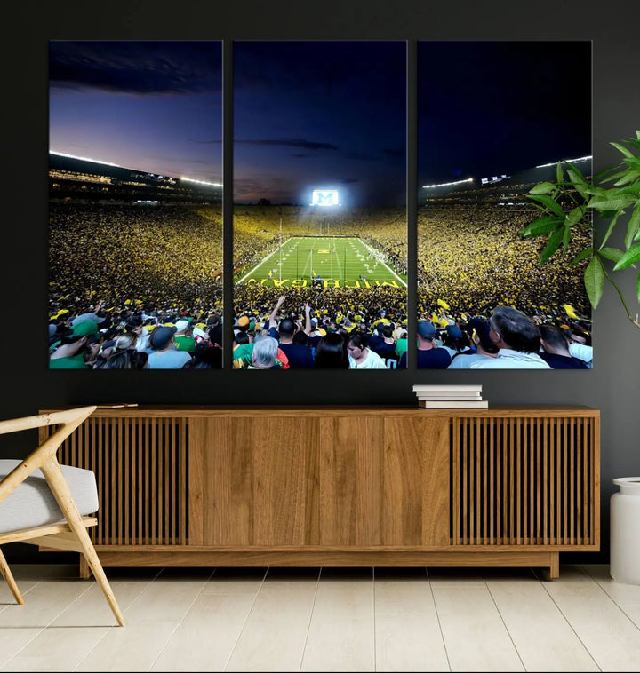 A triptych canvas art titled "University of Michigan Wolverines Football Team Print - Ann Arbor Michigan Stadium Wall Art Canvas Print" hangs prominently, featuring a gallery-quality finish and proudly handmade in the USA.