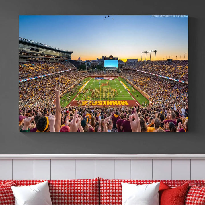 The University of Minnesota Golden Gophers Football Team Print captures the excitement of Minneapolis' Huntington Bank Stadium. This vibrant three-panel wall art showcases an enthusiastic crowd and a clear view of the field. Crafted on premium canvas with a gallery-quality finish, it transforms any space into an exhilarating sports sanctuary.