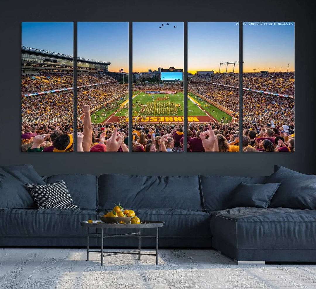 The University of Minnesota Golden Gophers Football Team Print captures the excitement of Minneapolis' Huntington Bank Stadium. This vibrant three-panel wall art showcases an enthusiastic crowd and a clear view of the field. Crafted on premium canvas with a gallery-quality finish, it transforms any space into an exhilarating sports sanctuary.