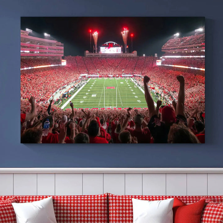 The University of Nebraska Cornhuskers Football Team Print, a vibrant three-panel canvas depicting Lincoln Memorial Stadium filled with enthusiastic fans from the end zone perspective, features a gallery-quality finish.