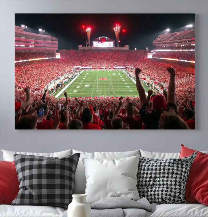 The University of Nebraska Cornhuskers Football Team Print, a vibrant three-panel canvas depicting Lincoln Memorial Stadium filled with enthusiastic fans from the end zone perspective, features a gallery-quality finish.