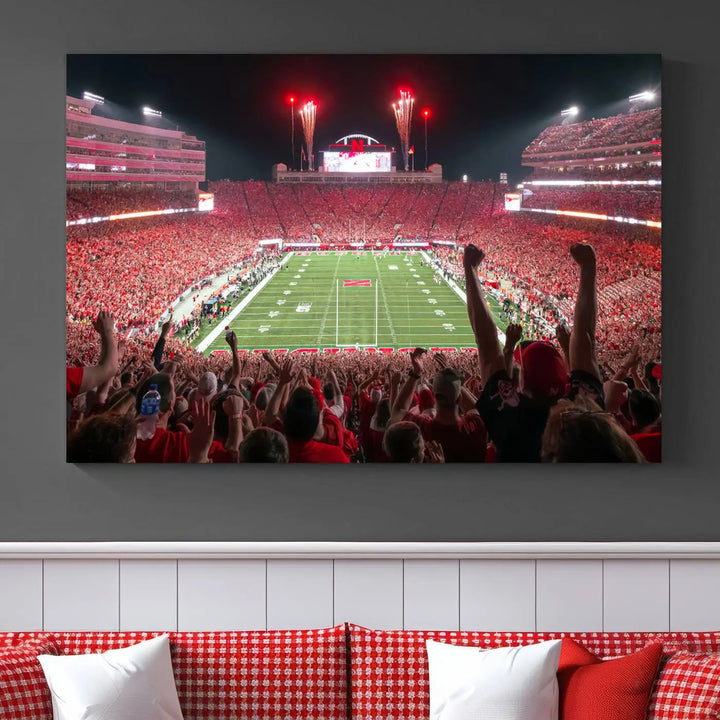 The University of Nebraska Cornhuskers Football Team Print, a vibrant three-panel canvas depicting Lincoln Memorial Stadium filled with enthusiastic fans from the end zone perspective, features a gallery-quality finish.