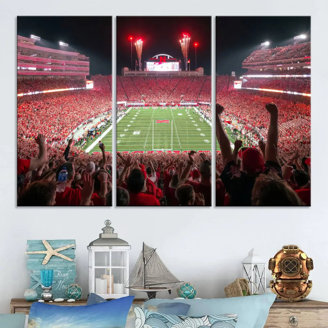 The University of Nebraska Cornhuskers Football Team Print, a vibrant three-panel canvas depicting Lincoln Memorial Stadium filled with enthusiastic fans from the end zone perspective, features a gallery-quality finish.