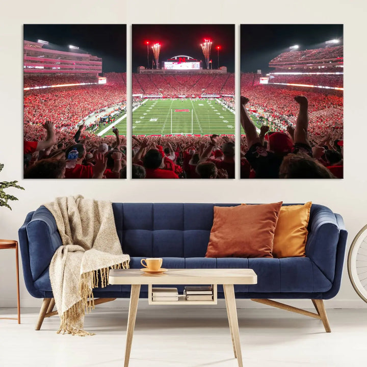 The University of Nebraska Cornhuskers Football Team Print, a vibrant three-panel canvas depicting Lincoln Memorial Stadium filled with enthusiastic fans from the end zone perspective, features a gallery-quality finish.