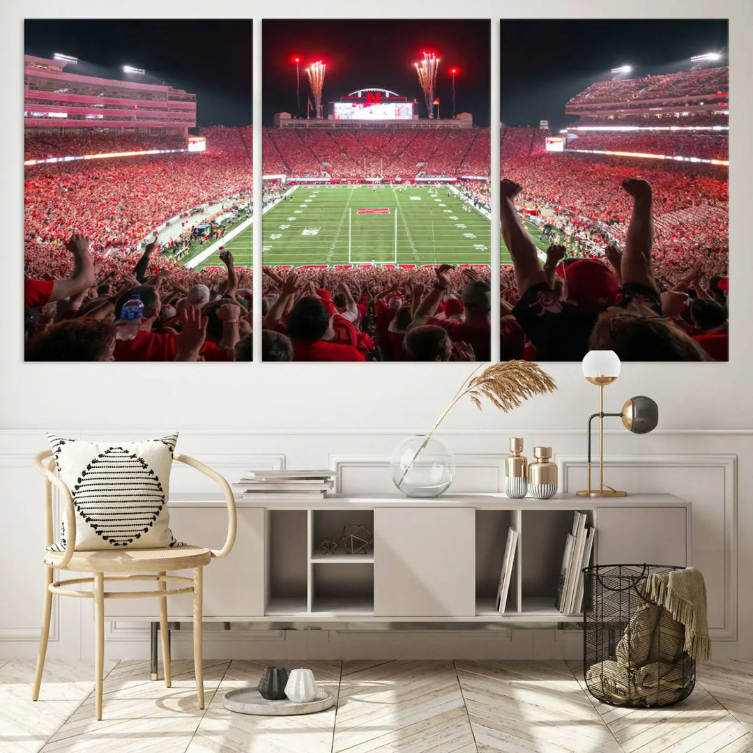 The University of Nebraska Cornhuskers Football Team Print, a vibrant three-panel canvas depicting Lincoln Memorial Stadium filled with enthusiastic fans from the end zone perspective, features a gallery-quality finish.