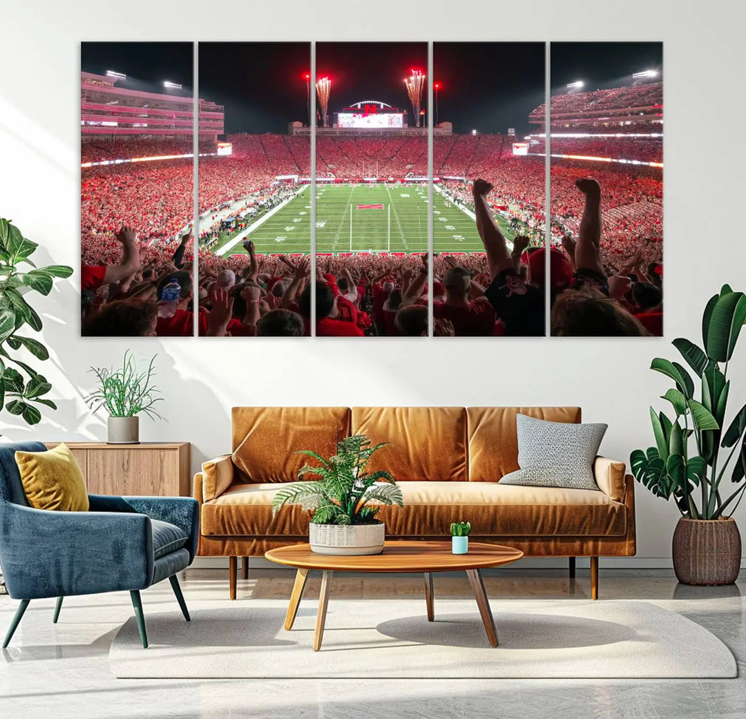 The University of Nebraska Cornhuskers Football Team Print, a vibrant three-panel canvas depicting Lincoln Memorial Stadium filled with enthusiastic fans from the end zone perspective, features a gallery-quality finish.