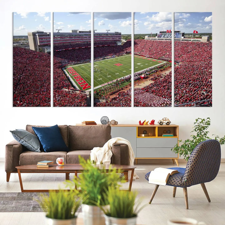 The University of Nebraska Cornhuskers Football Team Print showcases a vibrant triptych of Lincoln Memorial Stadium, depicting a packed football stadium filled with energetic fans. This handmade art piece is crafted in the USA and printed on premium canvas for a gallery-quality finish.