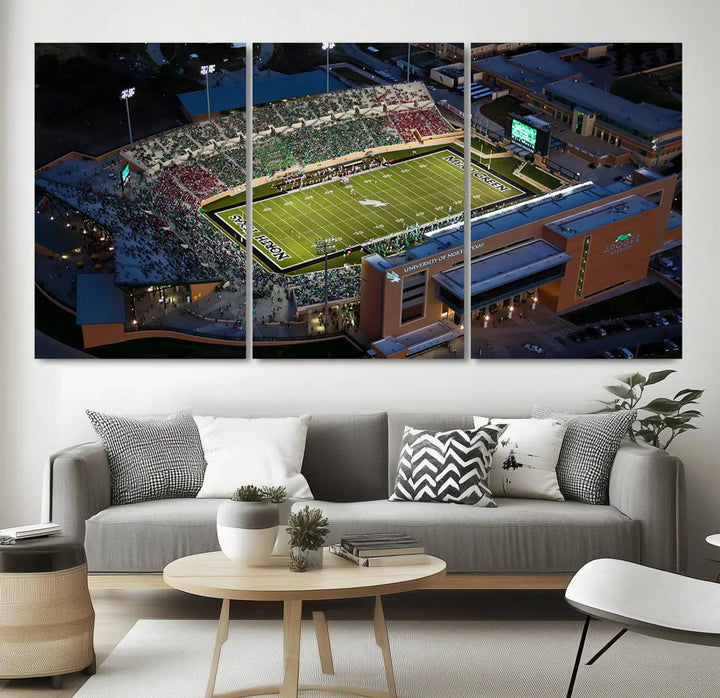 Aerial view of the University of North Texas Mean Green Football Team's DATCU Stadium at night, with packed stands, displayed on a premium canvas print as wall art.