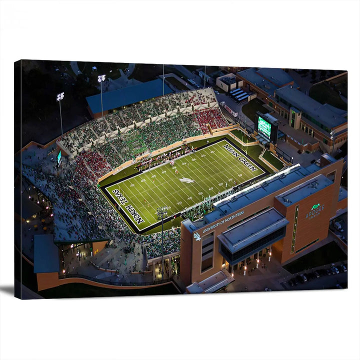 Aerial view of the University of North Texas Mean Green Football Team's DATCU Stadium at night, with packed stands, displayed on a premium canvas print as wall art.