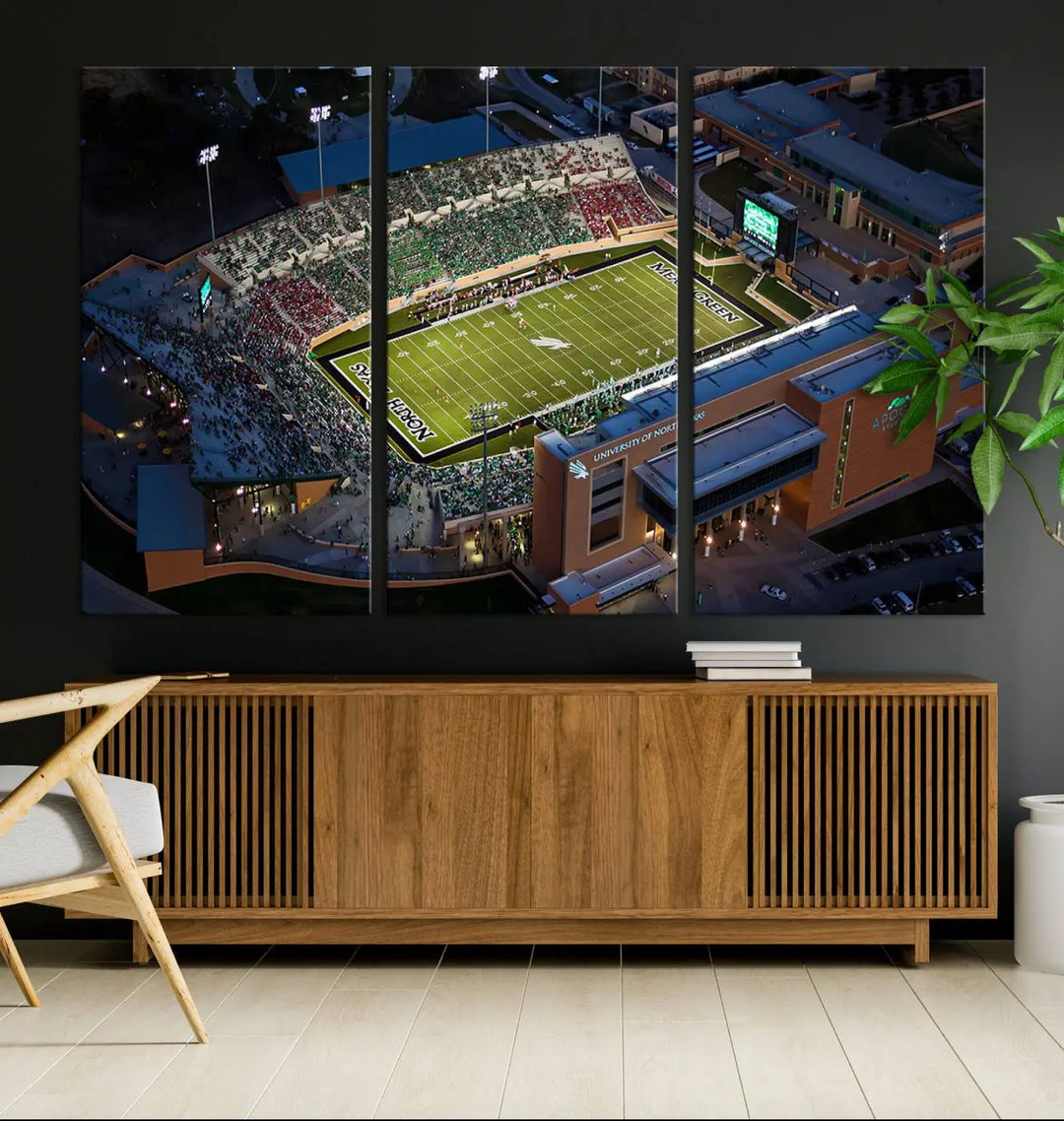 Aerial view of the University of North Texas Mean Green Football Team's DATCU Stadium at night, with packed stands, displayed on a premium canvas print as wall art.