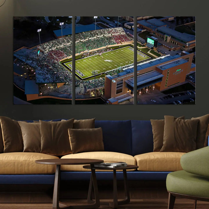 Aerial view of the University of North Texas Mean Green Football Team's DATCU Stadium at night, with packed stands, displayed on a premium canvas print as wall art.