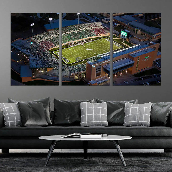 Aerial view of the University of North Texas Mean Green Football Team's DATCU Stadium at night, with packed stands, displayed on a premium canvas print as wall art.