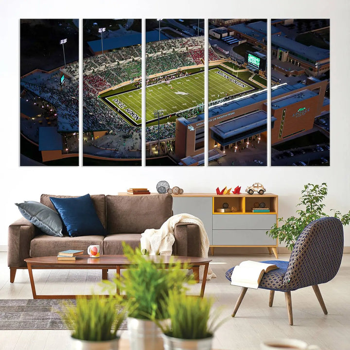 Aerial view of the University of North Texas Mean Green Football Team's DATCU Stadium at night, with packed stands, displayed on a premium canvas print as wall art.