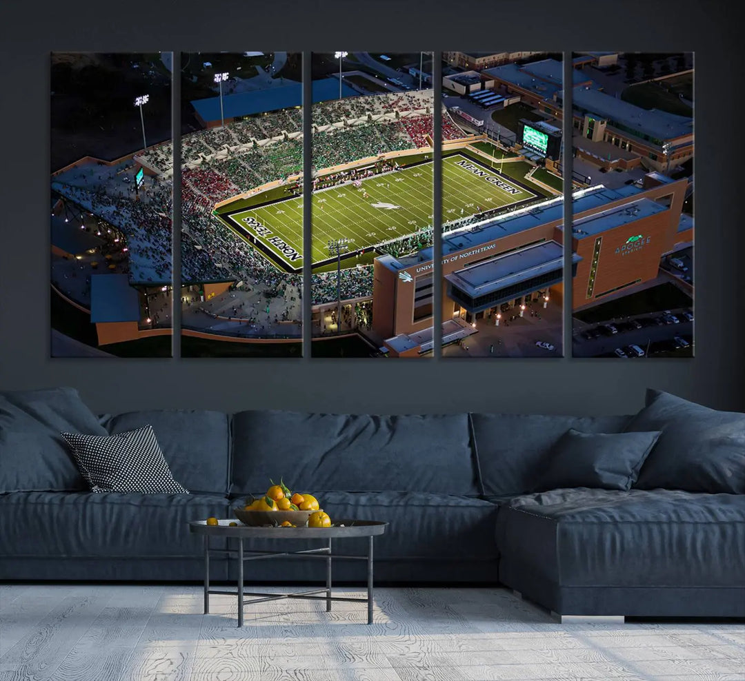 Aerial view of the University of North Texas Mean Green Football Team's DATCU Stadium at night, with packed stands, displayed on a premium canvas print as wall art.