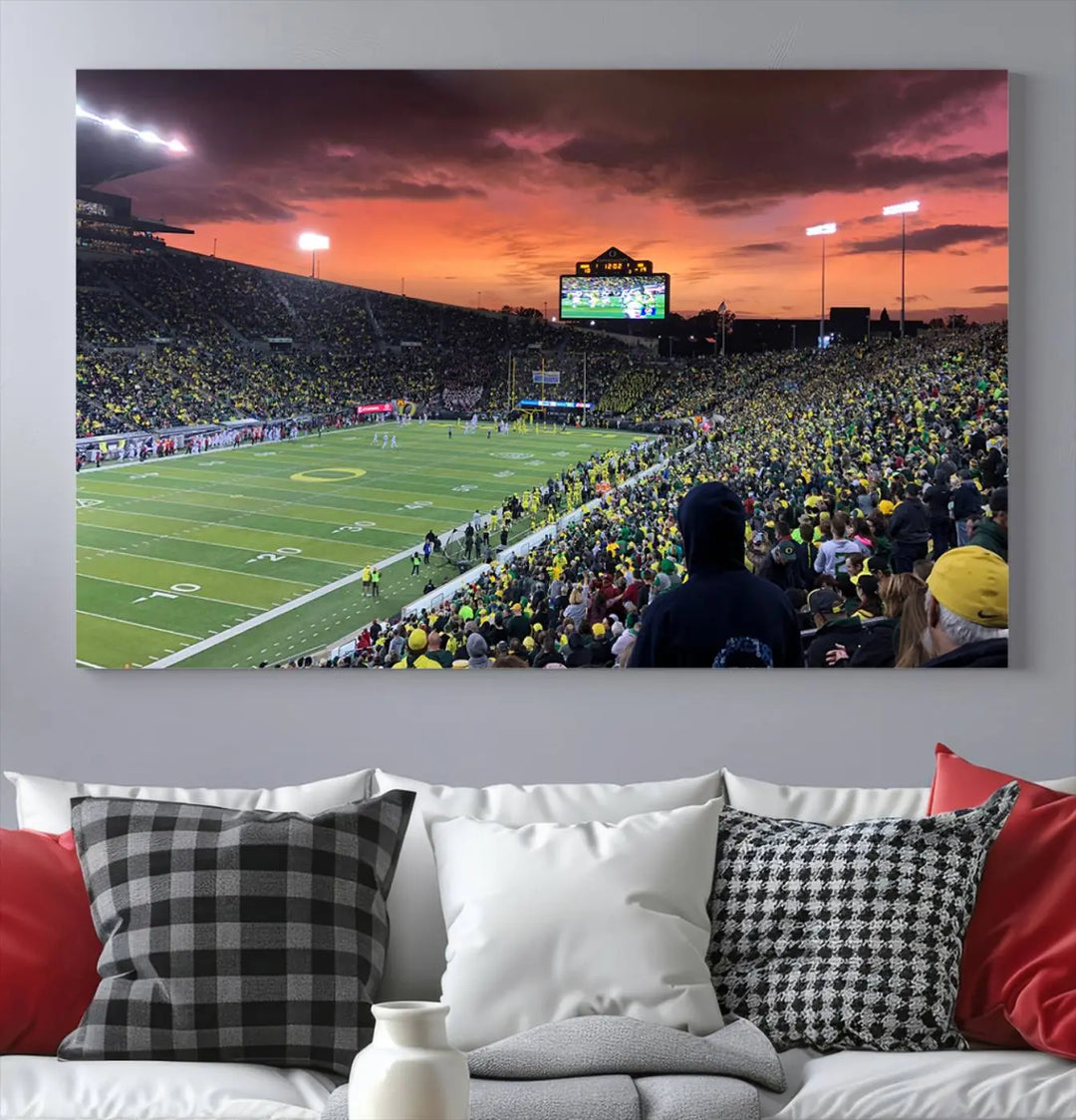 A premium canvas featuring the University of Oregon Ducks football team at Eugene's Autzen Stadium at sunset adorns the wall. Handmade in the USA, this elegant piece captures the vibrant energy of the scene.